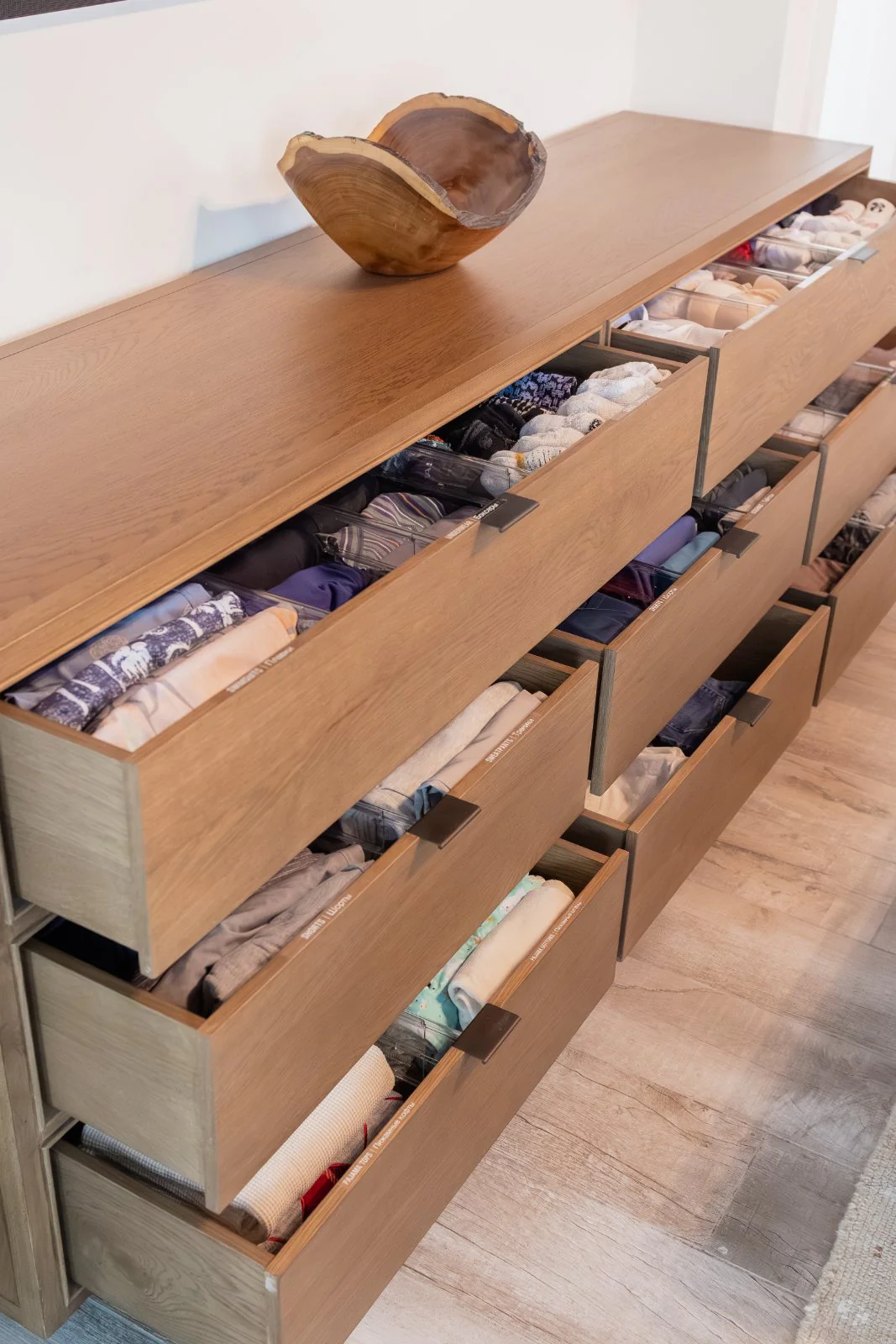 Folded and divided dresser drawers in a client home