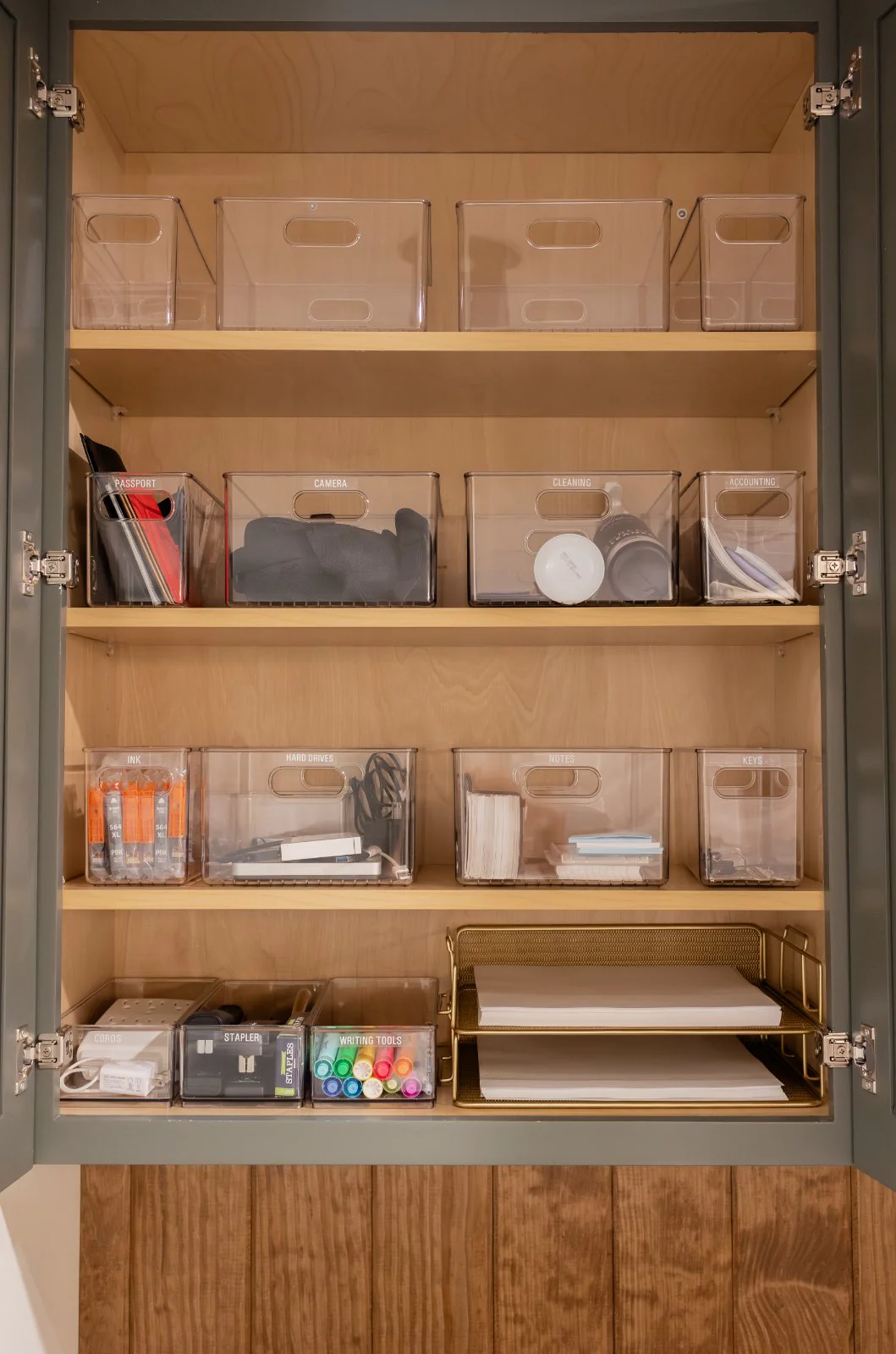 An office supply cabinet, every bin labeled
