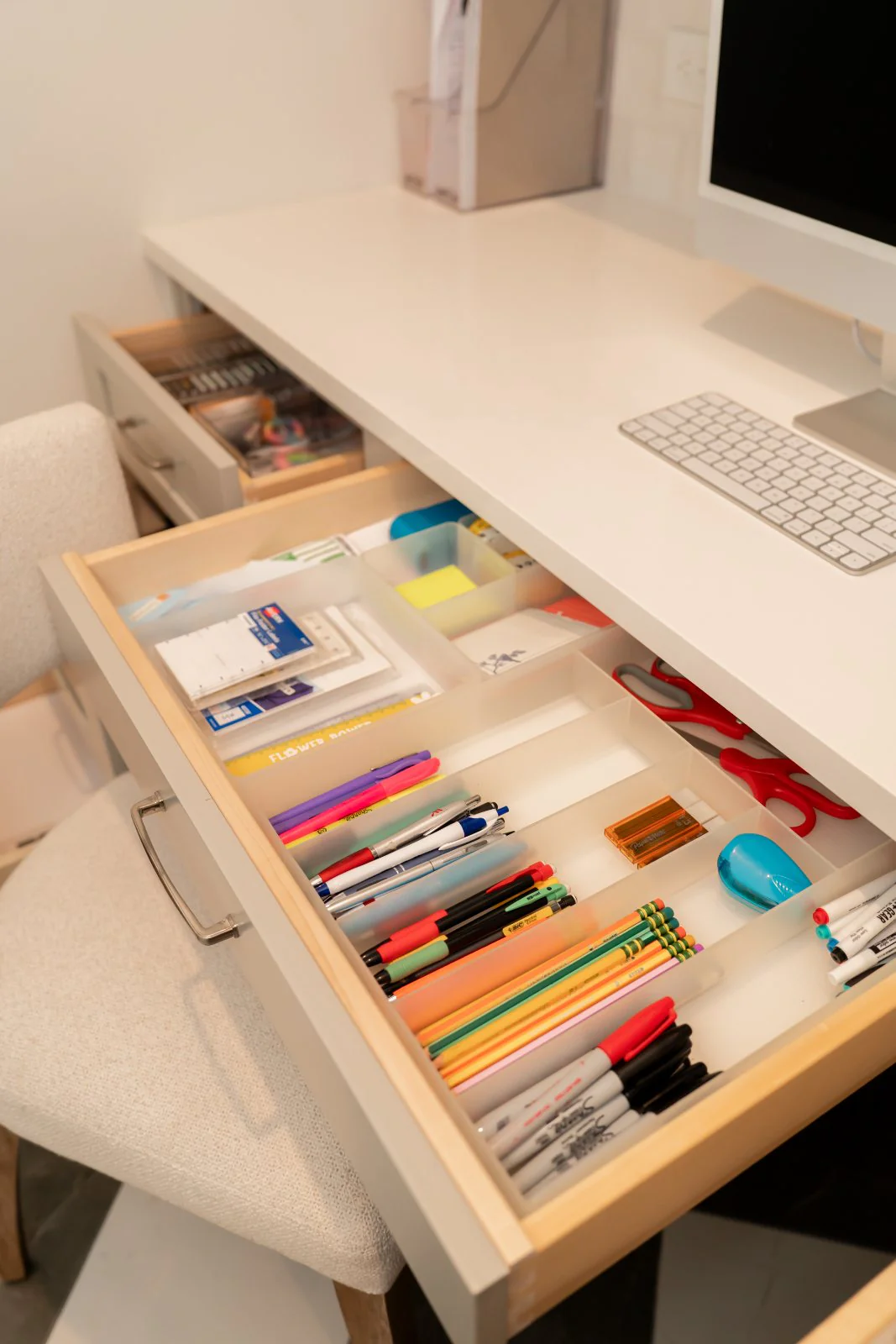 A divided desk drawer